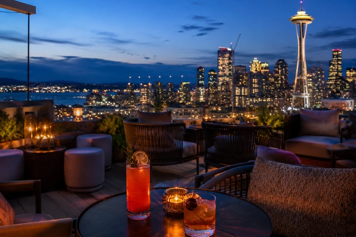 Crafted rooftop cocktails overlooking South Lake Union and the Seattle skyline